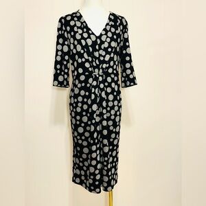 Armani Collezioni black polka dot midi dress size 14
In good condition.
